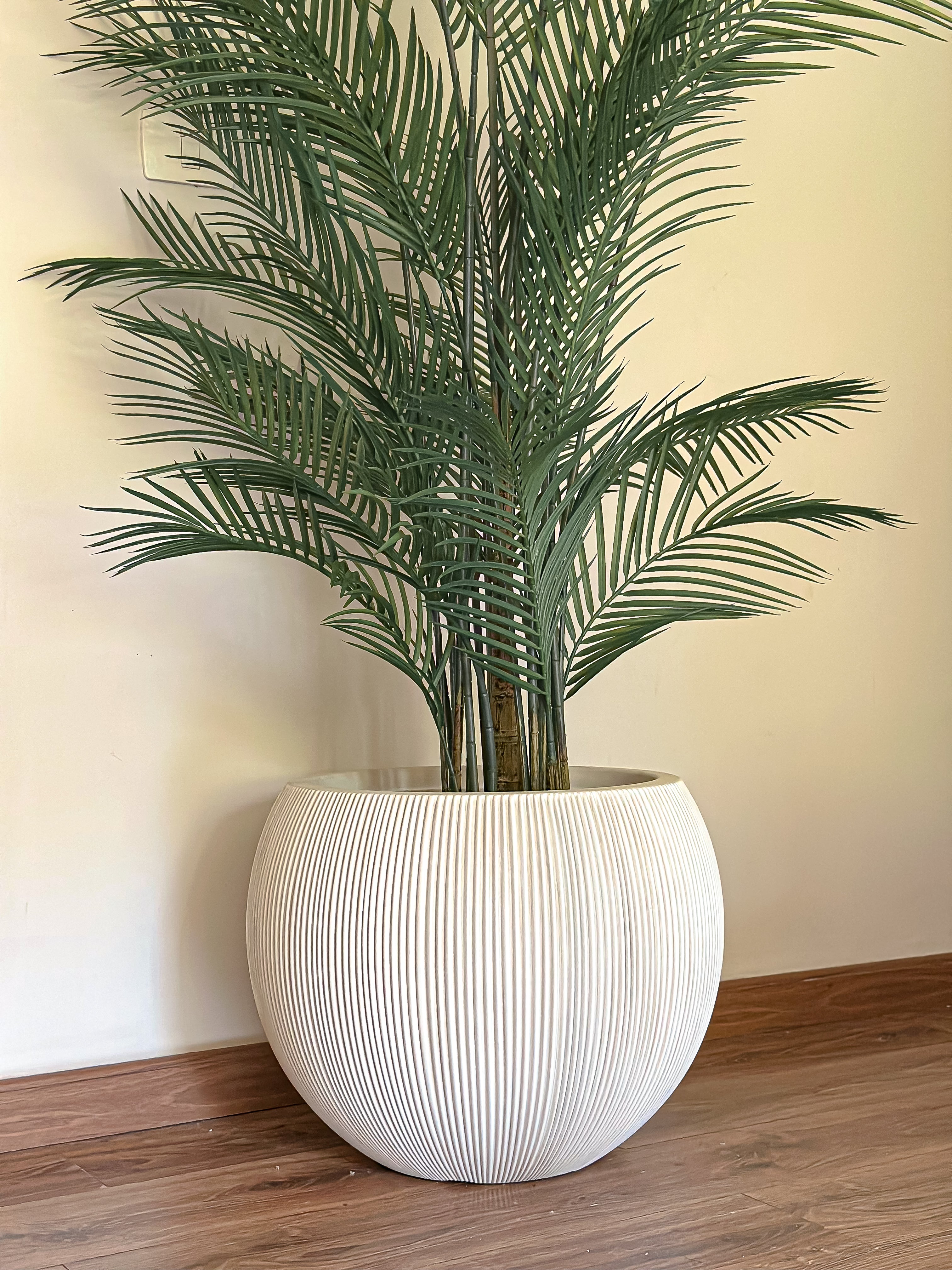 Rounded fiber glass plant pot