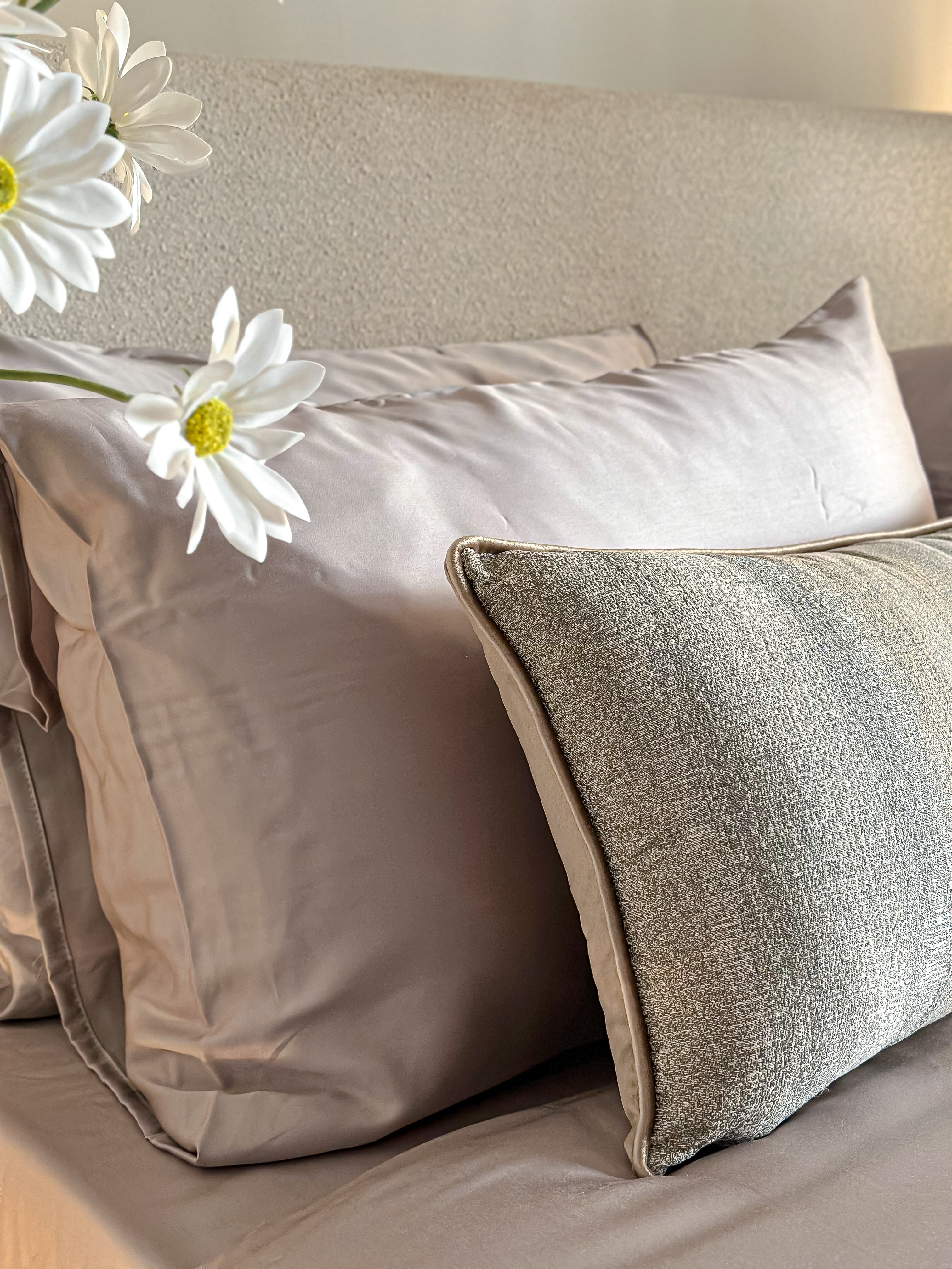 Linear greige cushion