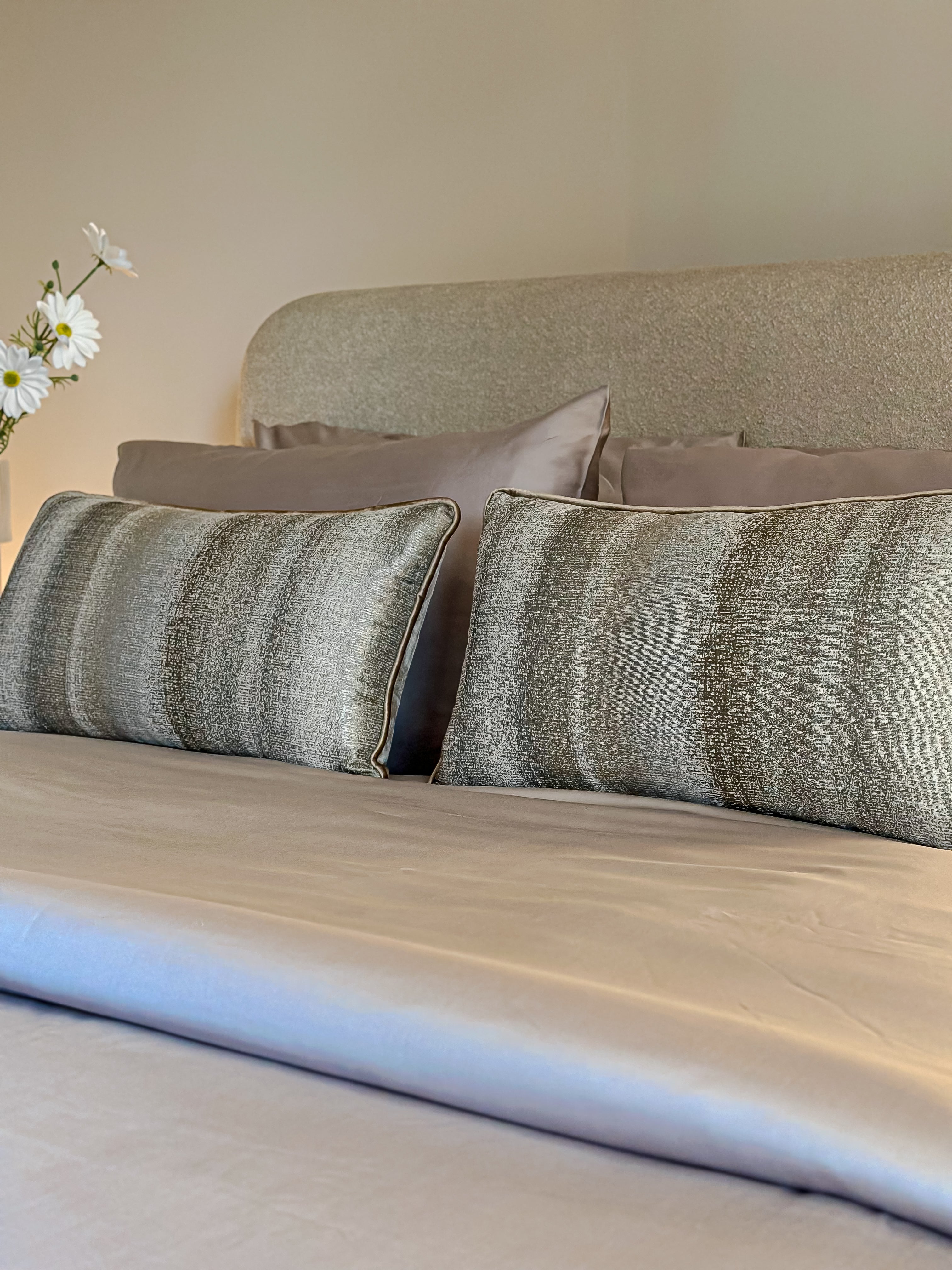 Linear greige cushion